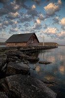 Portrait sunrise on Anderson boat house. WI