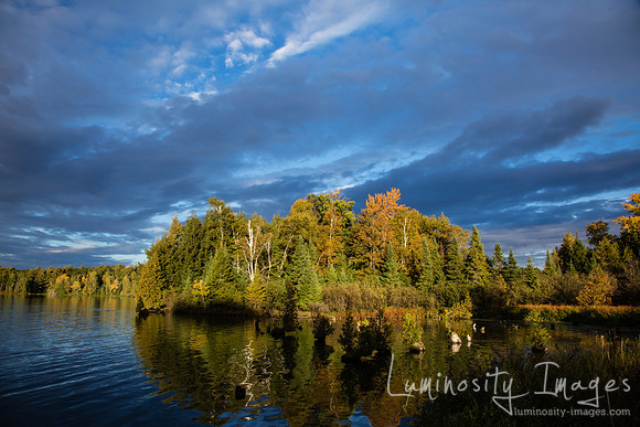 Dramatic sunset on Big Arborvitae Lake Wisconsin.