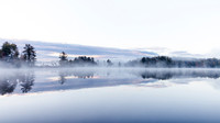 Misty fall sunrise on Bearskin Lake, WI.