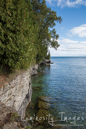 Shoreline cliffs meet Lake Michigan. WI