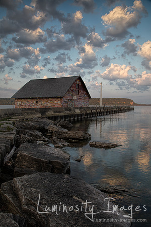 Portrait sunrise on Anderson boat house. WI