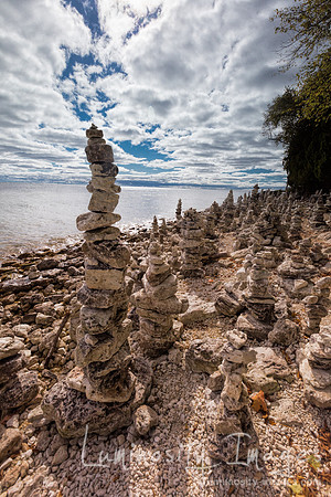 Cairn stone pillars on Cave Point beach. Wisconsin.