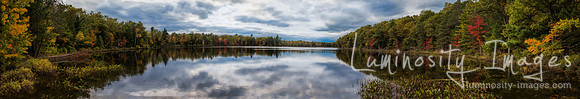 Panorama of early fall morning sunrise on Mcgrath Lake. WI