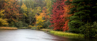 Panorama of misty fall colors on West Plum Lake, WI.