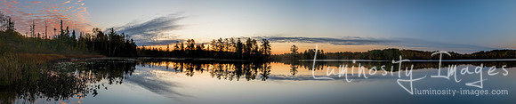 Panorama of early morning sunrise on Bearskin Lake. WI