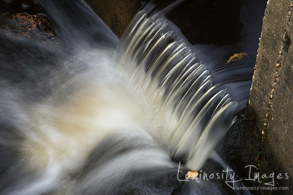 Closeup waterfall in autumn. Daniel Wright Forest Preserve, IL.